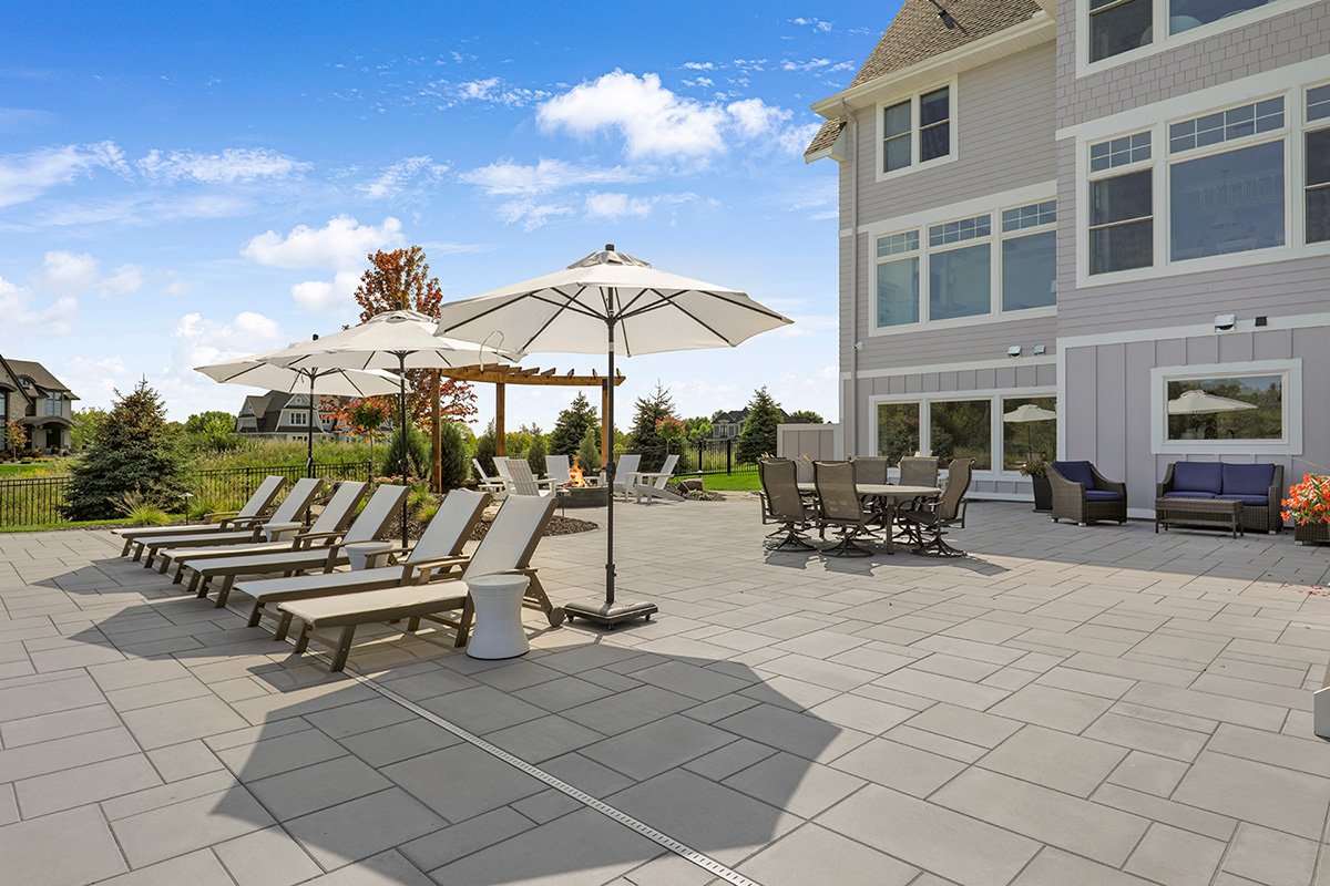 Pavers Over Stamped Concrete For Your Outdoor Patio - Custom One Landscaping